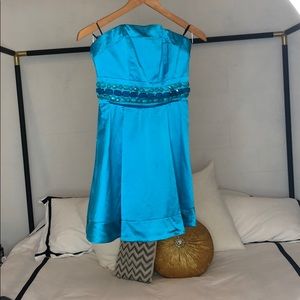 Summer ready turquoise, strapless Bebe dress